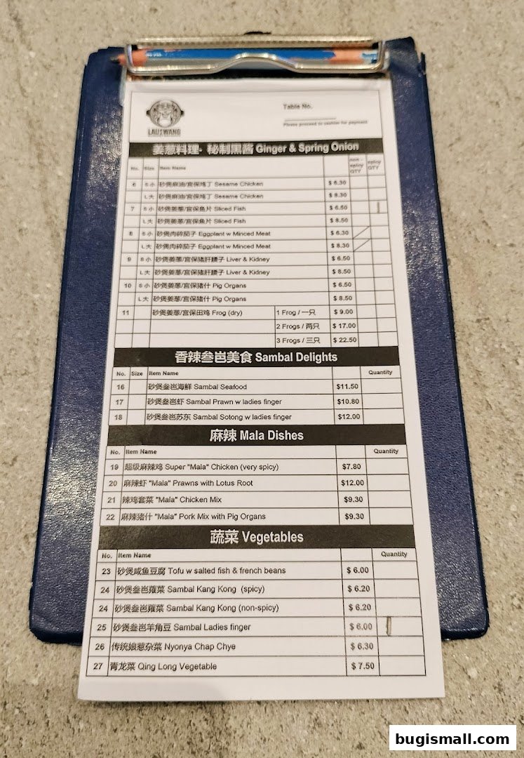 A menu from Lau Wang Claypot Delights featuring Ginger & Spring Onion dishes, Sambal Delights, Mala Dishes, and Vegetables.