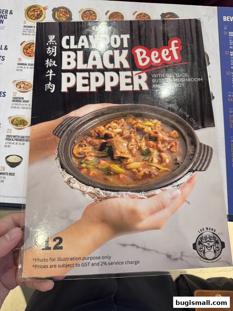 A menu featuring Claypot Black Pepper Beef with vegetables.