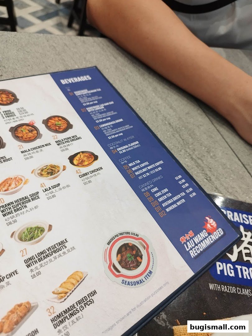 A menu from Lau Wang Claypot Delights featuring various dishes and beverages.