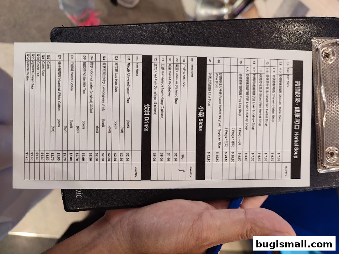 A menu from Lau Wang Claypot Delights featuring herbal soups, sides, and drinks.
