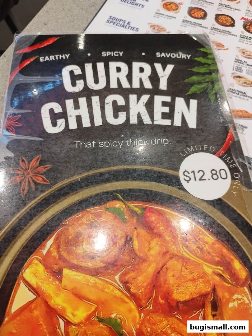 A menu item for Curry Chicken with a price of $12.80.