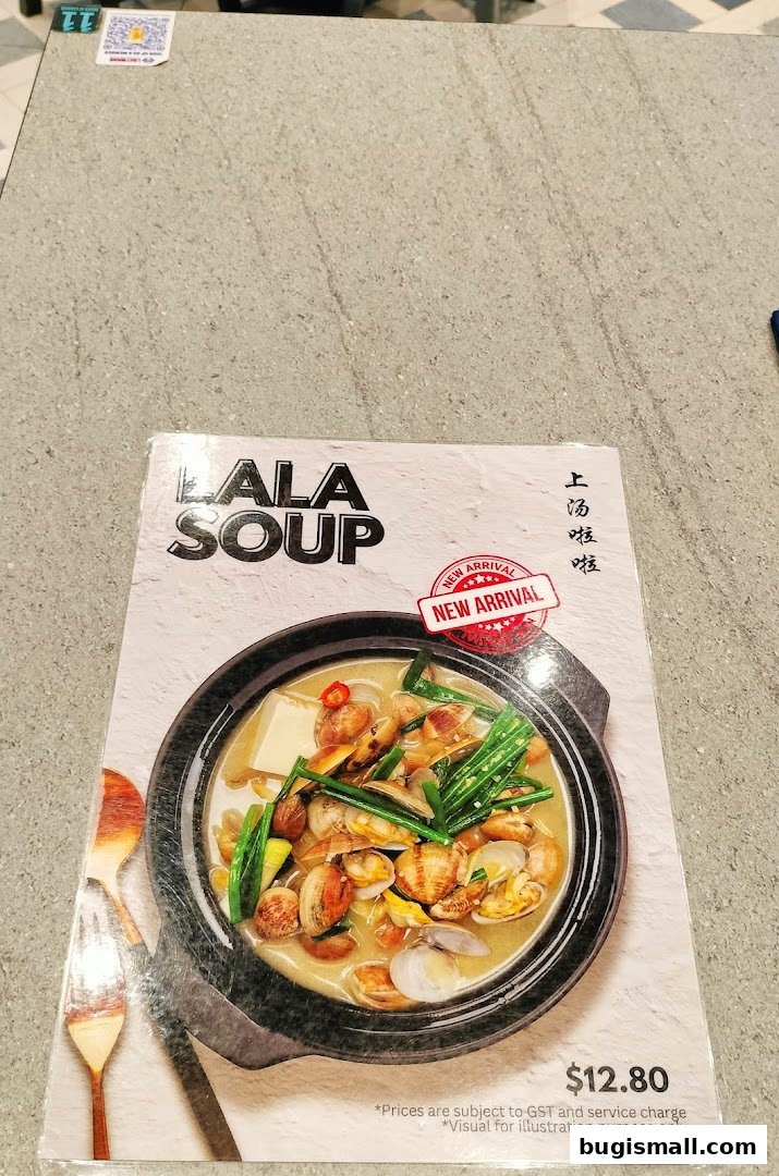 A menu featuring a bowl of Lala soup with clams and vegetables, priced at $12.80.