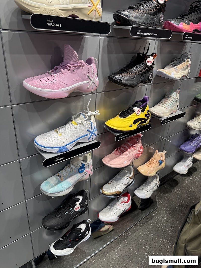 A wall display showcasing a variety of Li-Ning athletic shoes in different colors and styles.