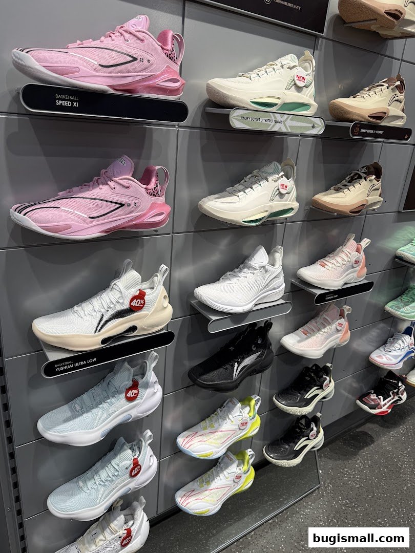A display of various Li-Ning athletic shoes, featuring basketball and lifestyle sneakers in different colors.