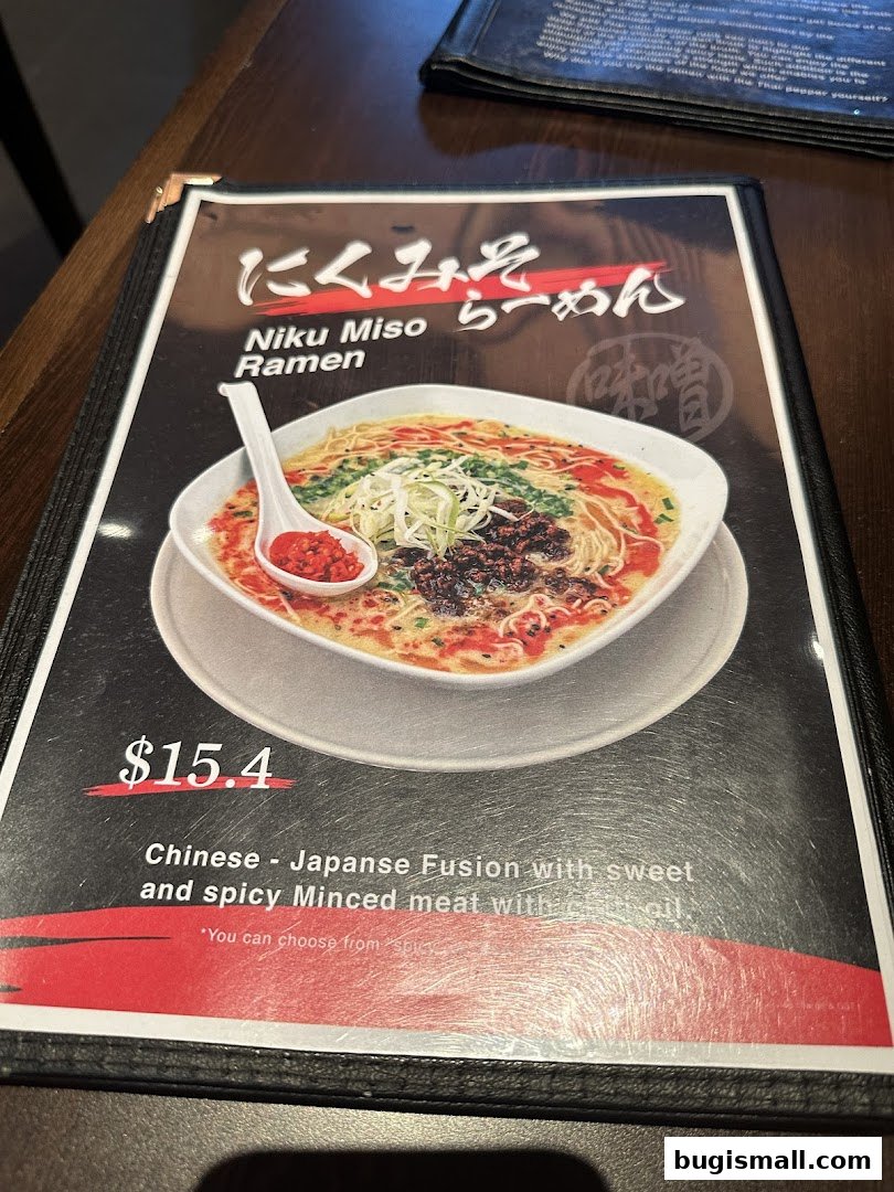 A menu featuring Niku Miso Ramen with a price of $15.4.