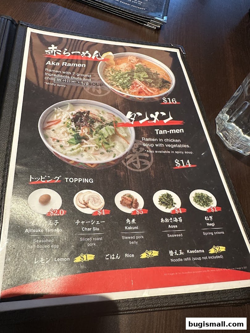 A menu from Marutama Ramen Bugis showcasing different ramen dishes and toppings.