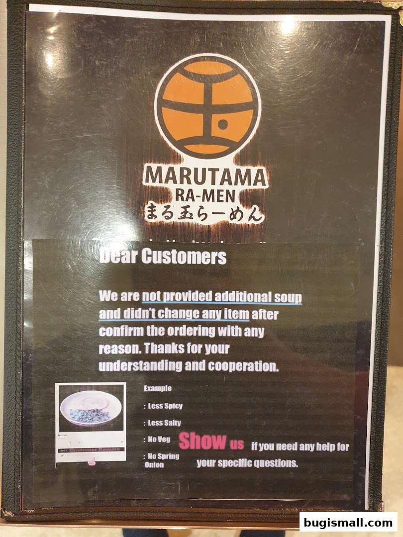 A sign from Marutama Ramen Bugis explaining their policy on soup and order changes.
