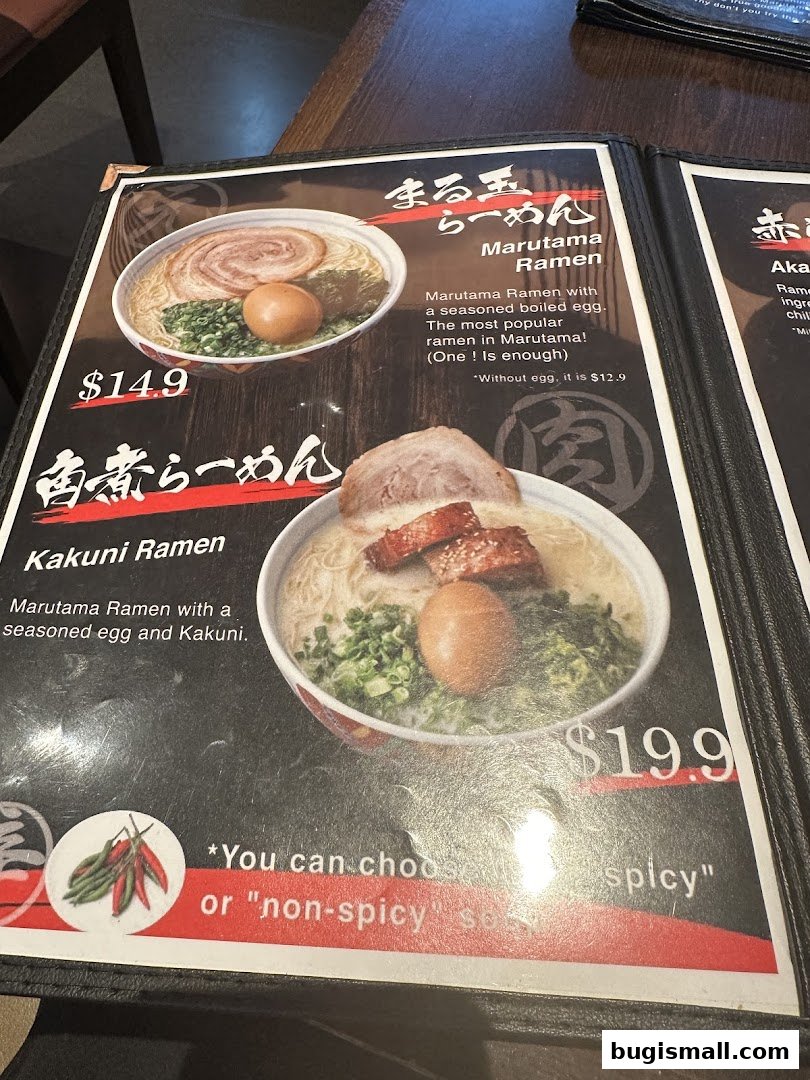 A menu featuring two bowls of ramen, Marutama Ramen and Kakuni Ramen, with prices.