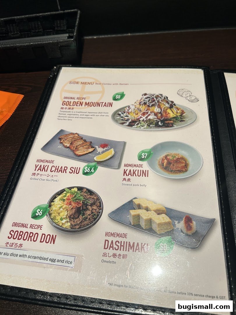 A menu featuring Japanese side dishes like Golden Mountain, Yaki Char Siu, Kakuni, Soboro Don, and Dashimaki.