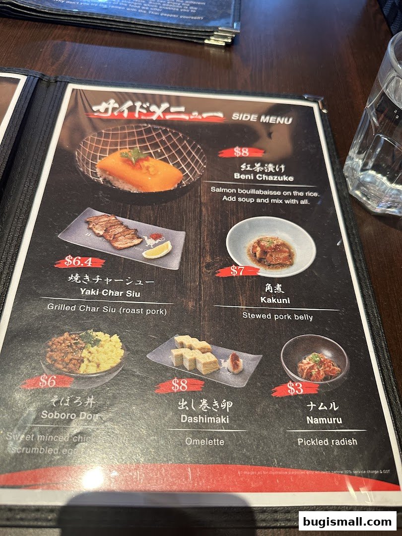 A menu from Marutama Ramen Bugis featuring various side dishes and their descriptions.