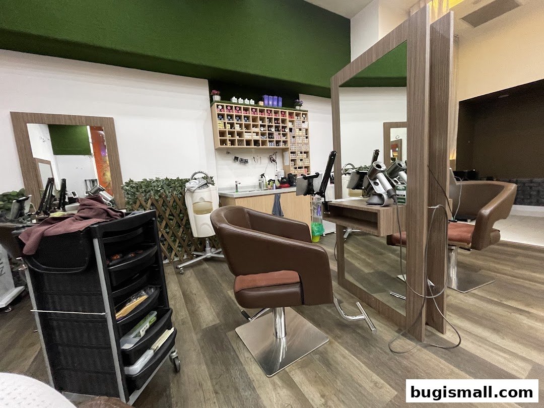 Interior of a hair studio with styling chairs, mirrors, and hair products.