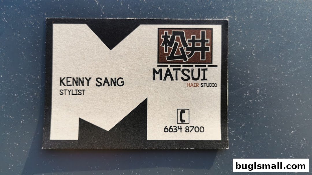 A business card for Kenny Sang, a stylist at Matsui Hair Studio.