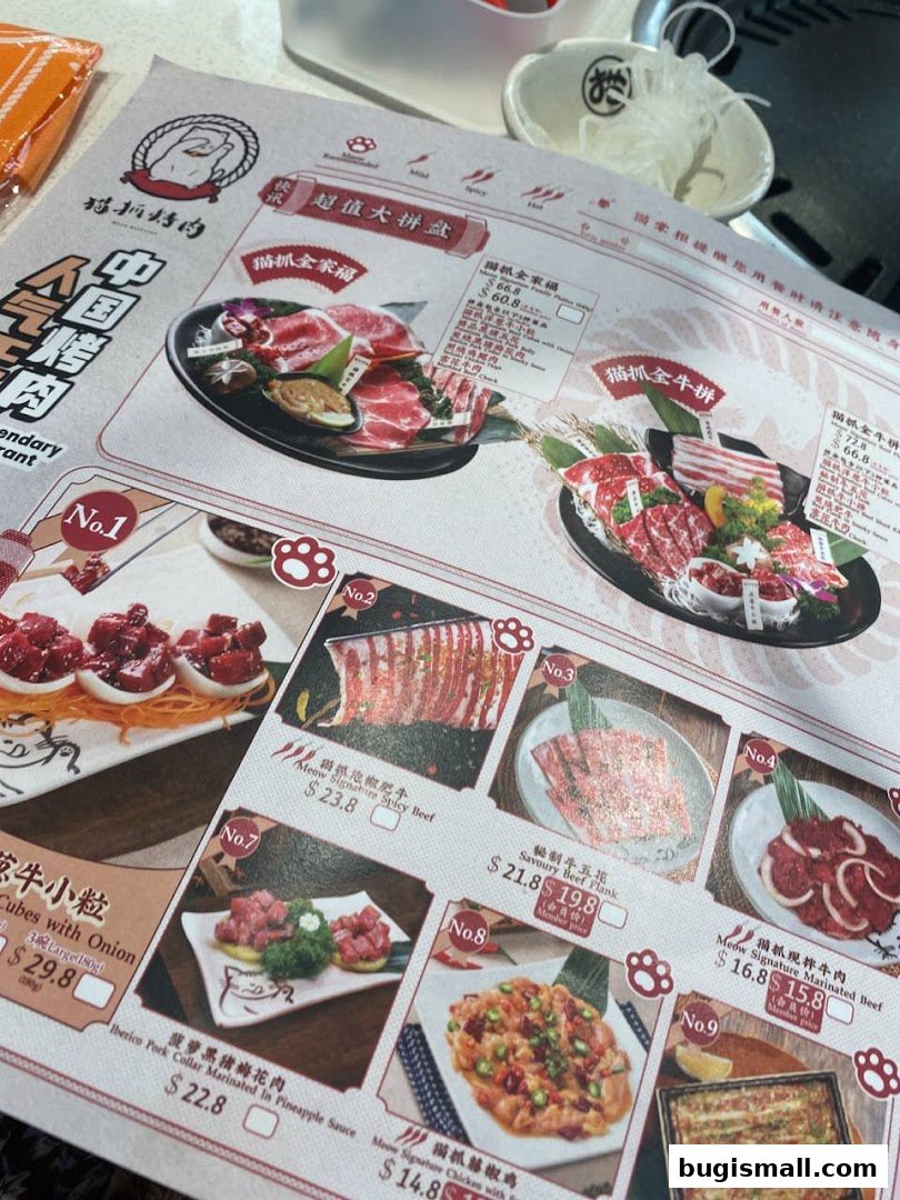 A menu from Meow Barbecue featuring various meat platters and dishes with prices.