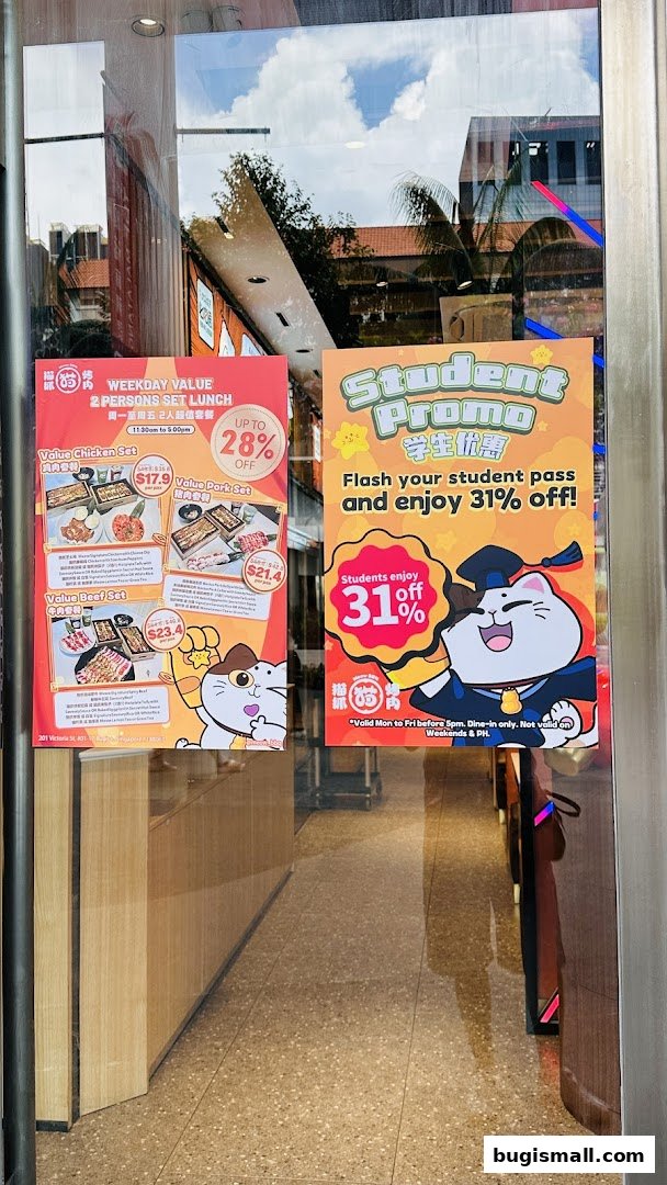 Shop window displays featuring promotions for weekday value sets and student discounts.