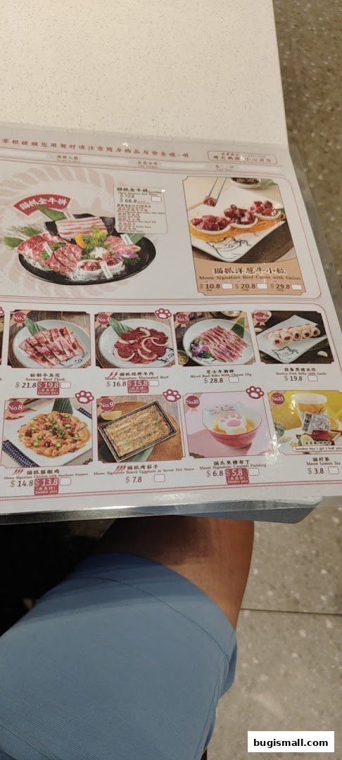 A menu from Meow Barbecue featuring various meat dishes and desserts, with prices listed.