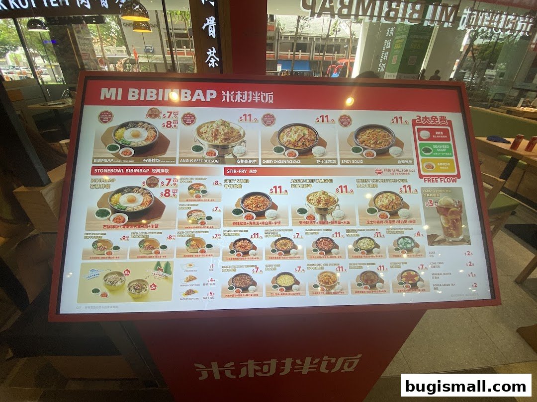 A menu board for Mi Bibimbap, showcasing various Korean dishes with prices.