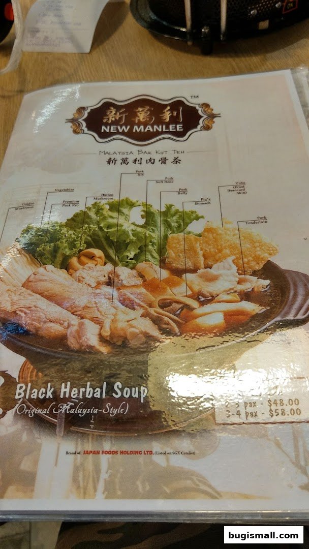 A menu showcasing a detailed illustration of Bak Kut Teh with various ingredients labeled.