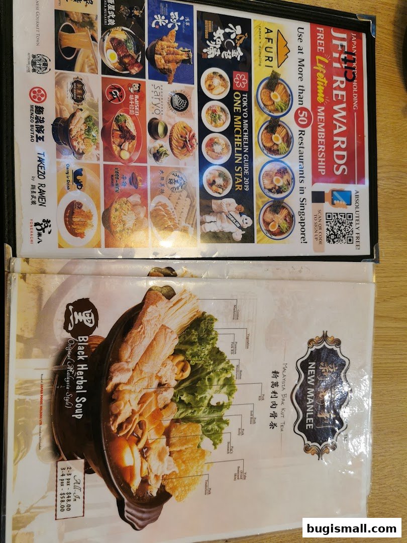A menu featuring Bak Kut Teh and various ramen dishes, with a rewards program advertisement.