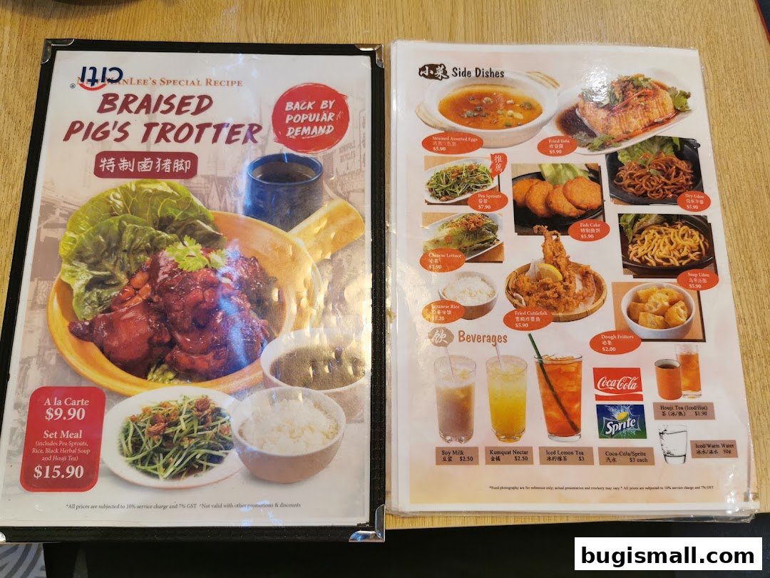 A menu featuring Braised Pig's Trotter and various side dishes and beverages.