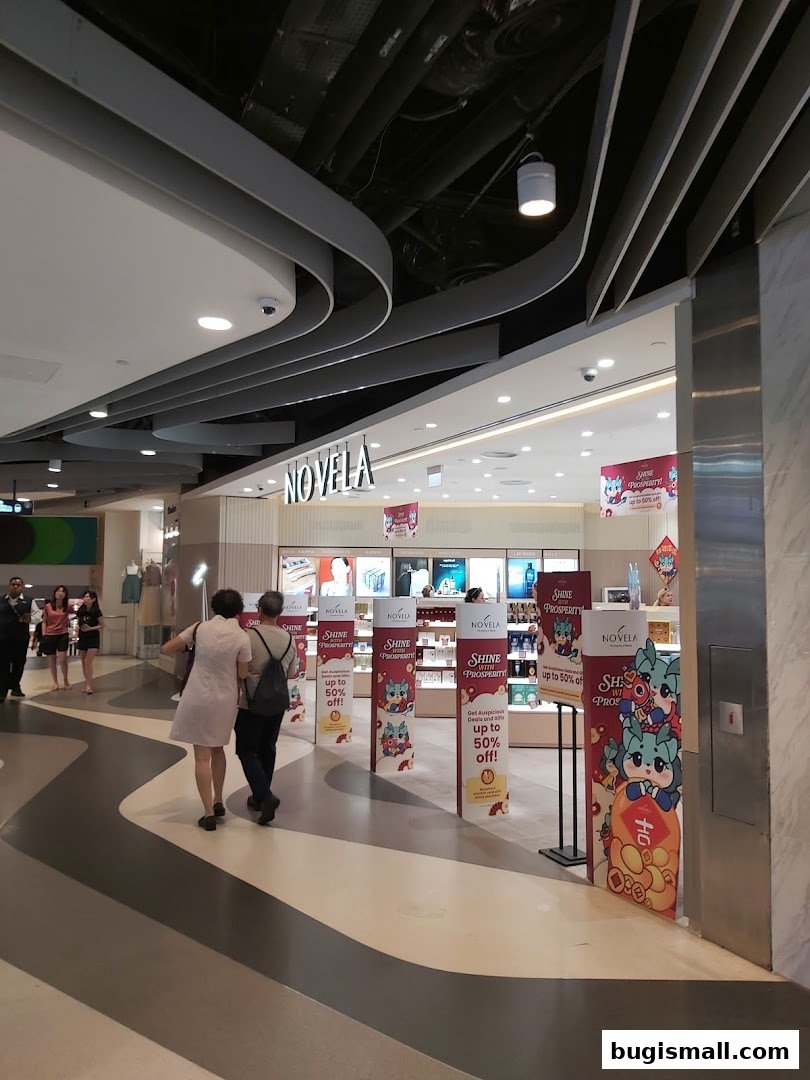 The entrance to the Novela shop with promotional banners and displays.