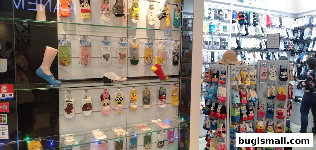 A retail shop displaying a wide variety of character-themed socks and accessories.