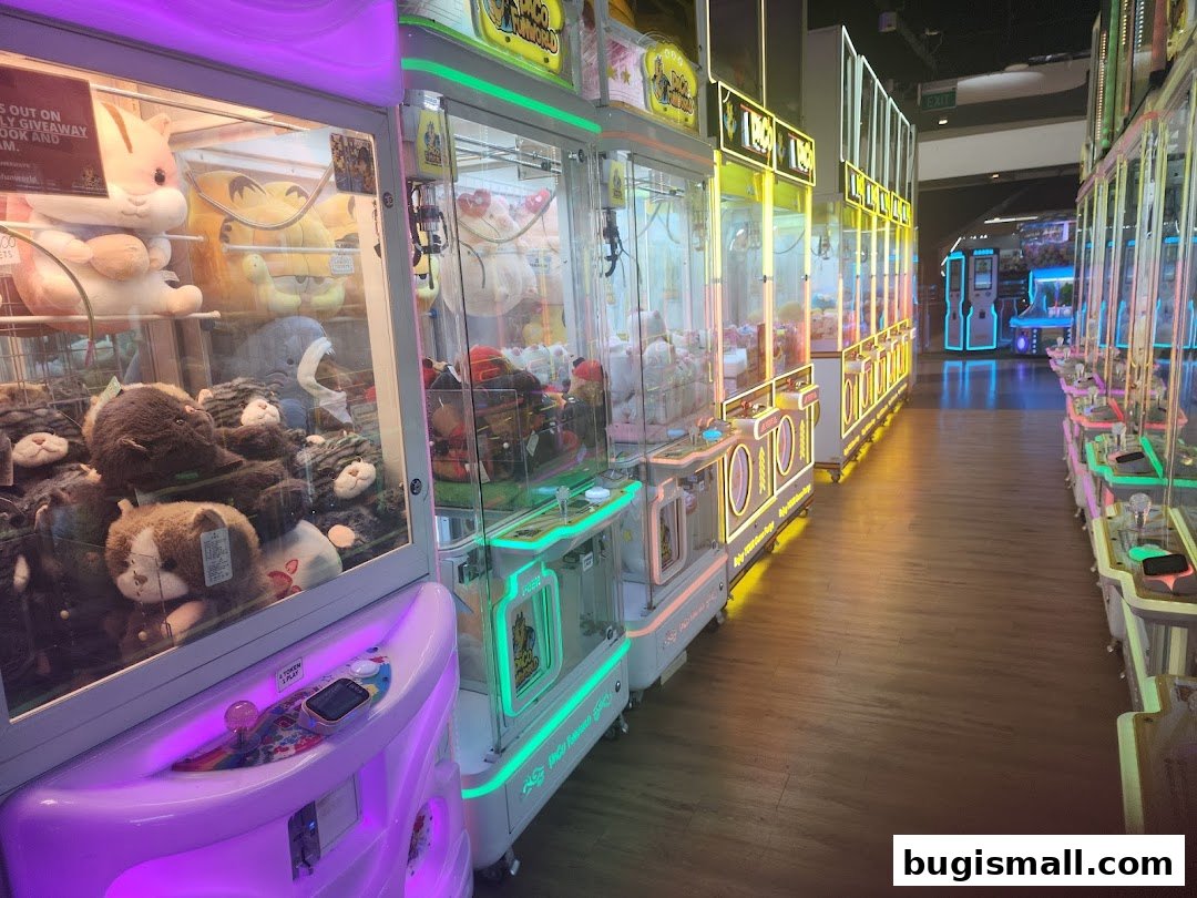 A brightly lit arcade with rows of claw machines filled with plush toys.