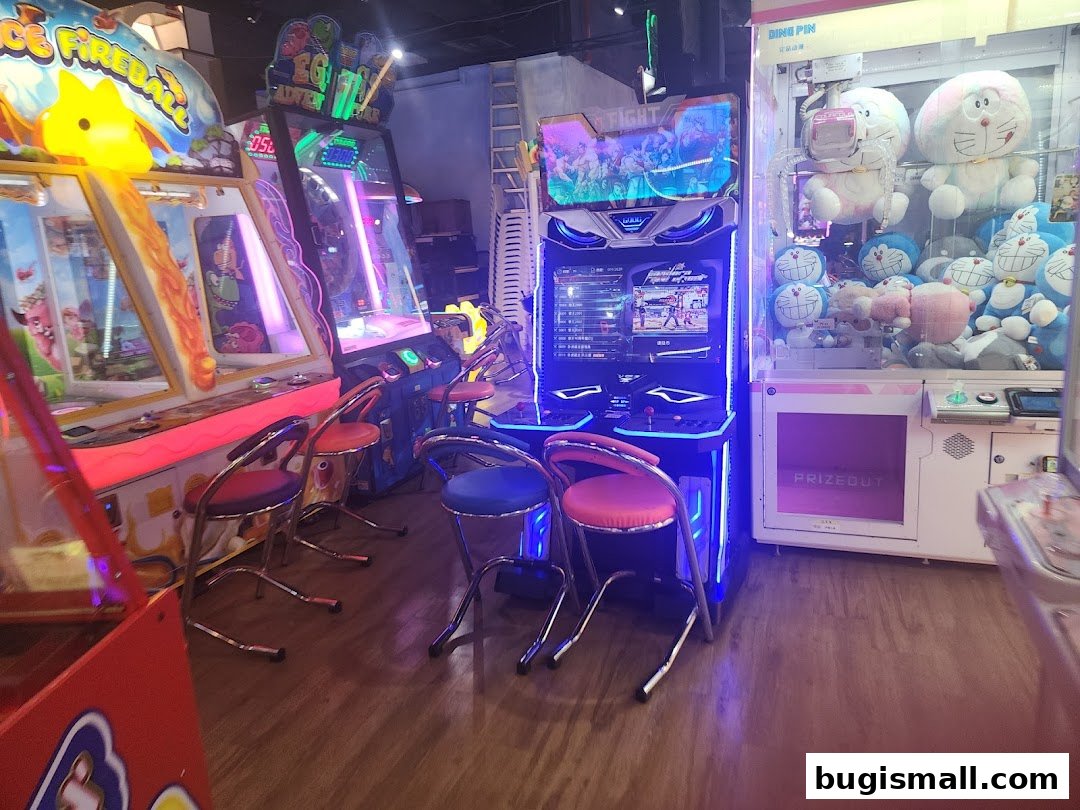 Arcade games and claw machines filled with plush toys at Paco FunWorld.