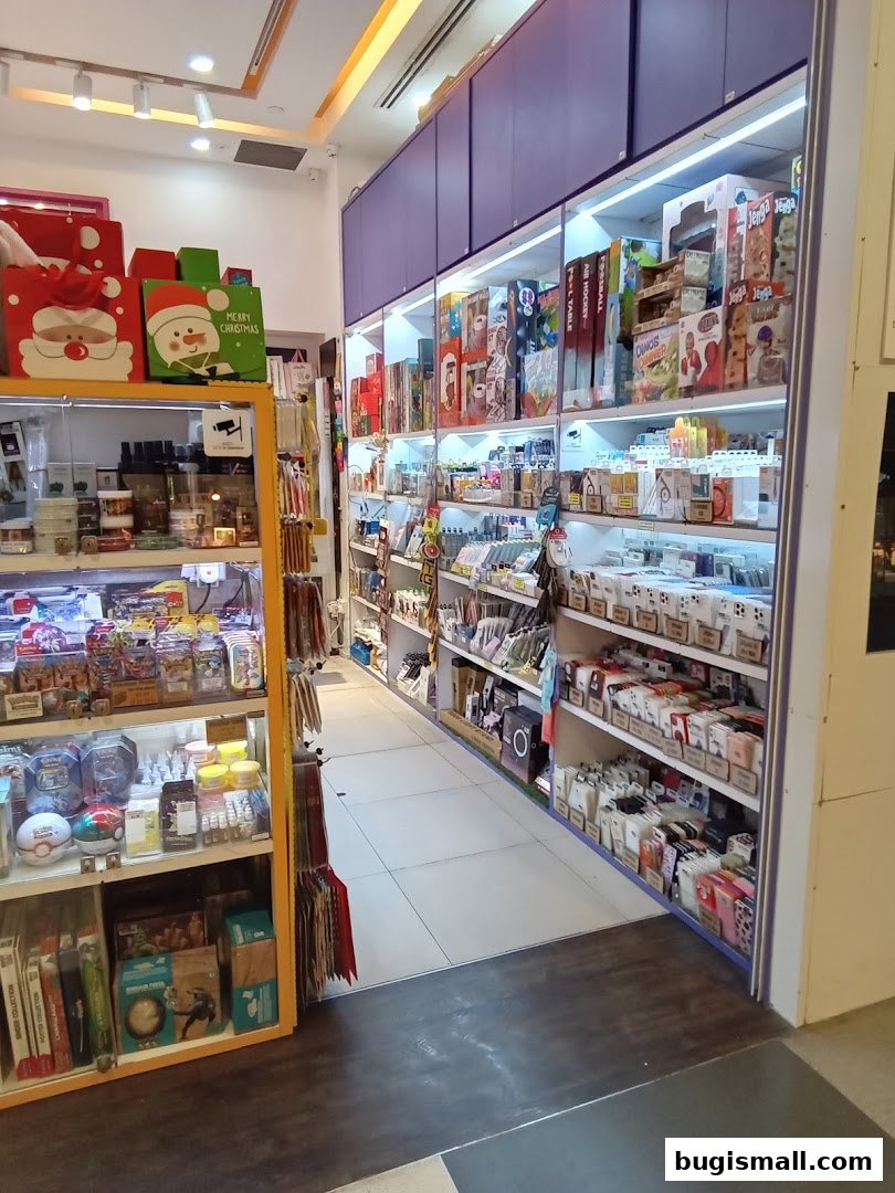 A well-lit retail store interior showcasing shelves filled with various products and gift bags.