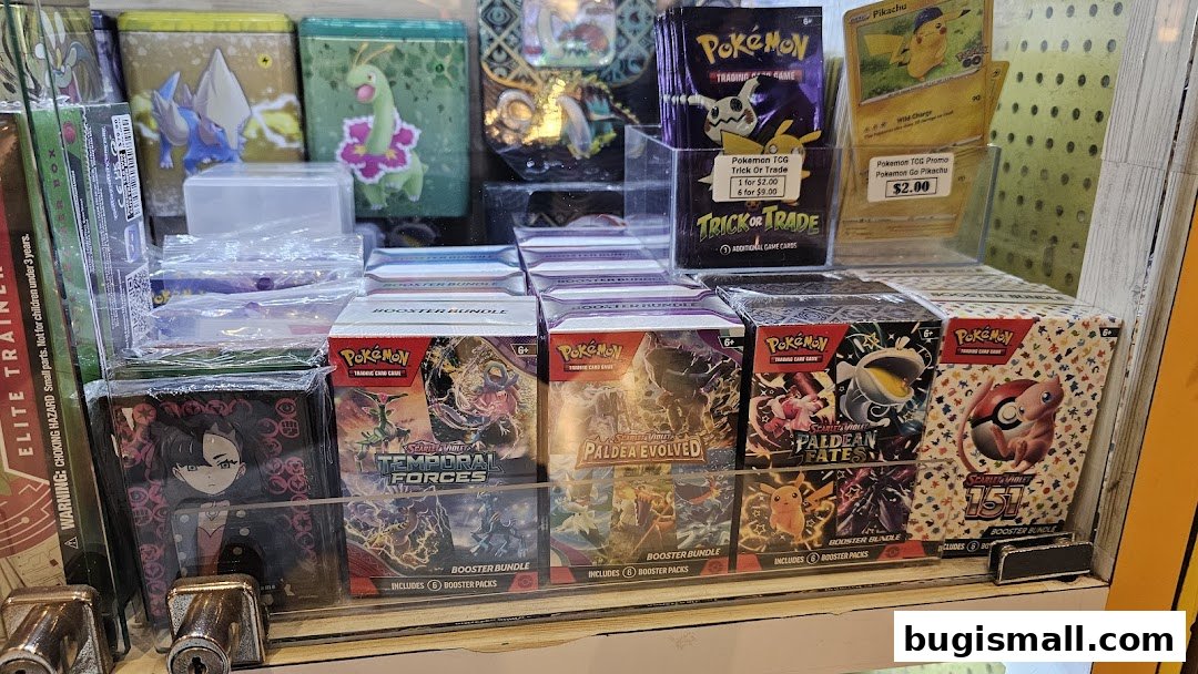 A display of various Pokemon trading card game booster bundles and promotional items.