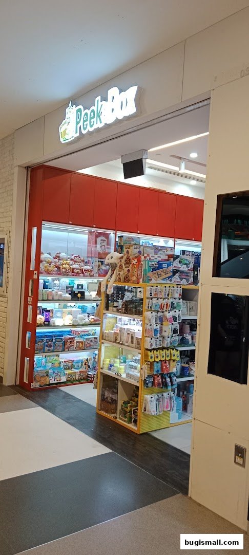 The entrance of Peek A Box shop, showcasing a variety of toys and novelty items.