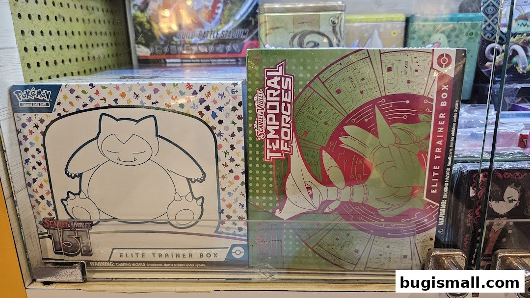 Pokemon trading card game elite trainer boxes displayed in a retail setting.