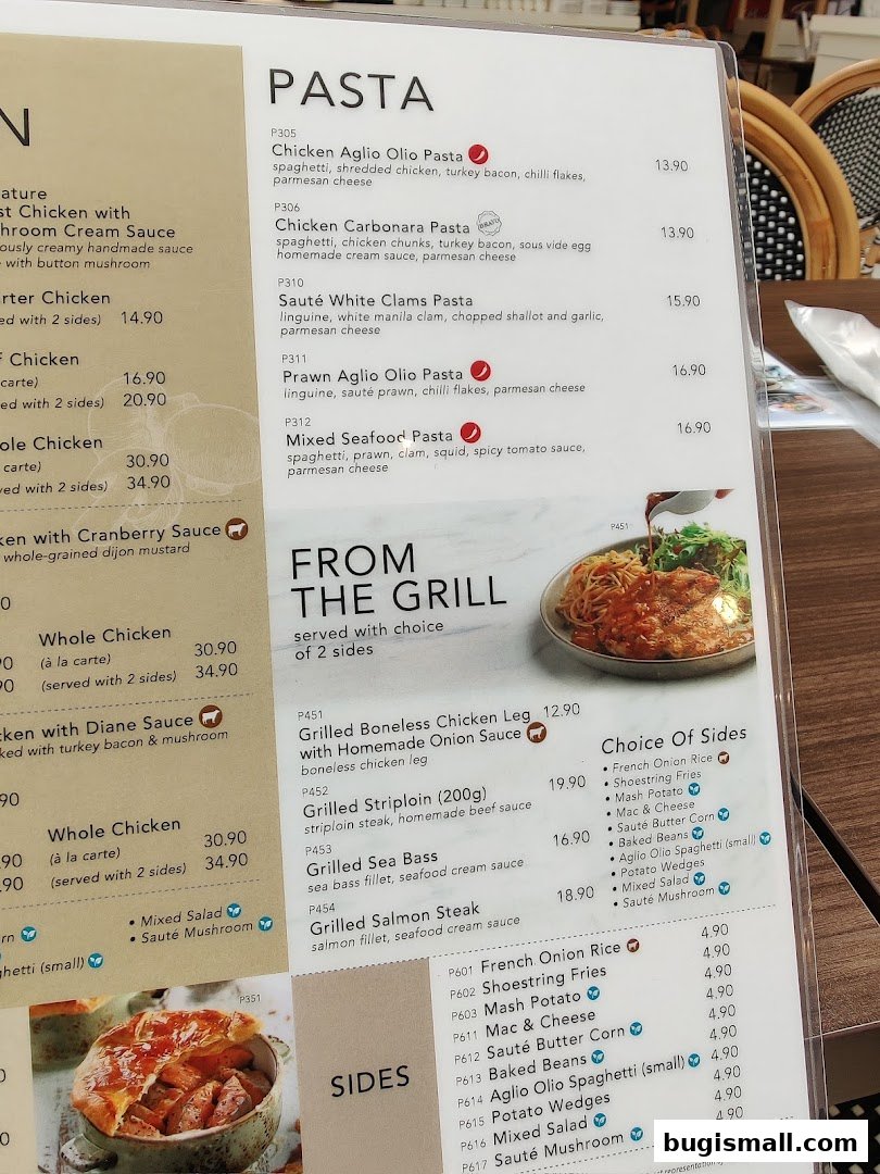 A menu featuring pasta dishes, grilled items, and sides with prices.
