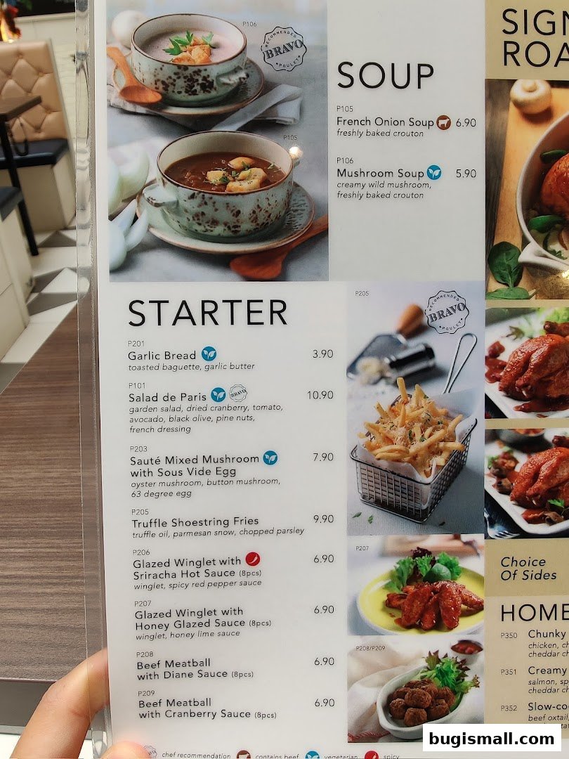 A menu featuring soups, starters, and sides with enticing descriptions and prices.