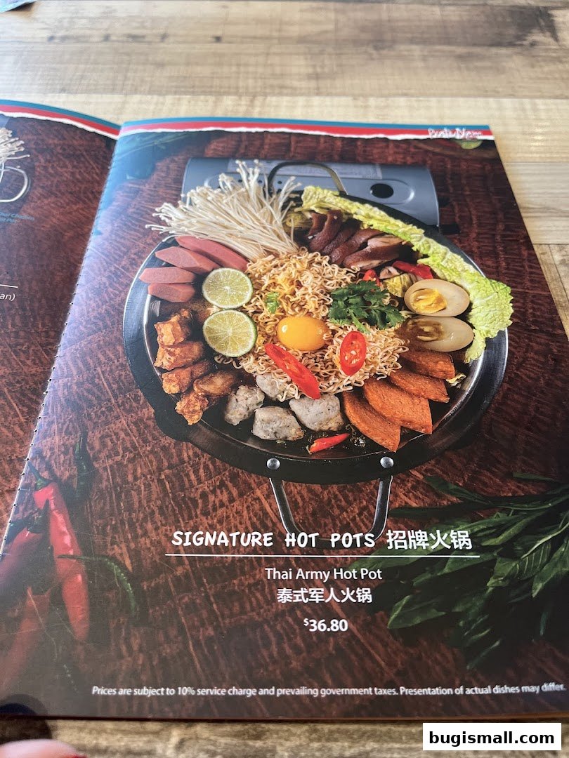 A menu page showcasing a vibrant and hearty Thai Army Hot Pot.