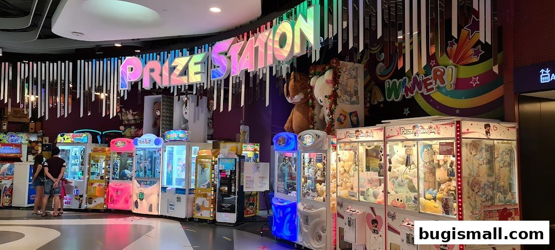Prize Station arcade with various claw machines filled with plush toys.