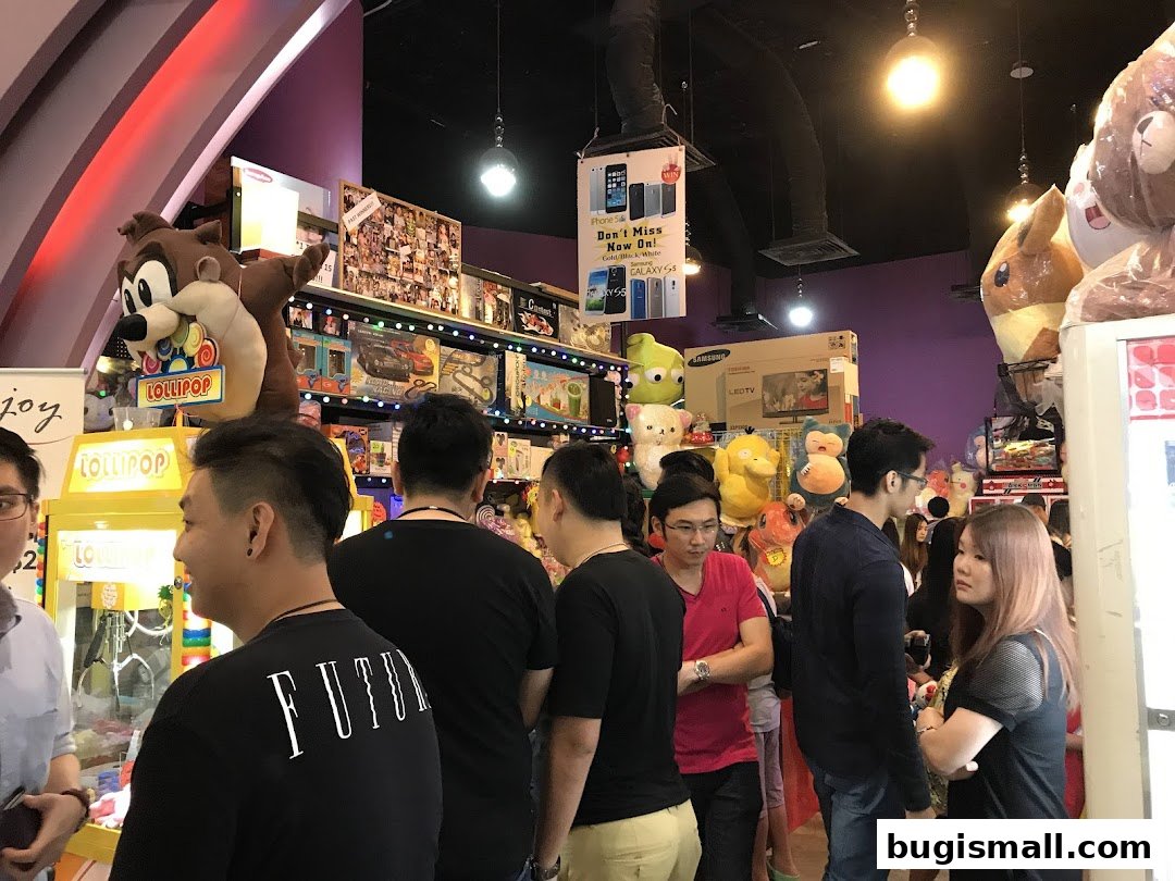 People browsing a brightly lit shop filled with plush toys and merchandise.