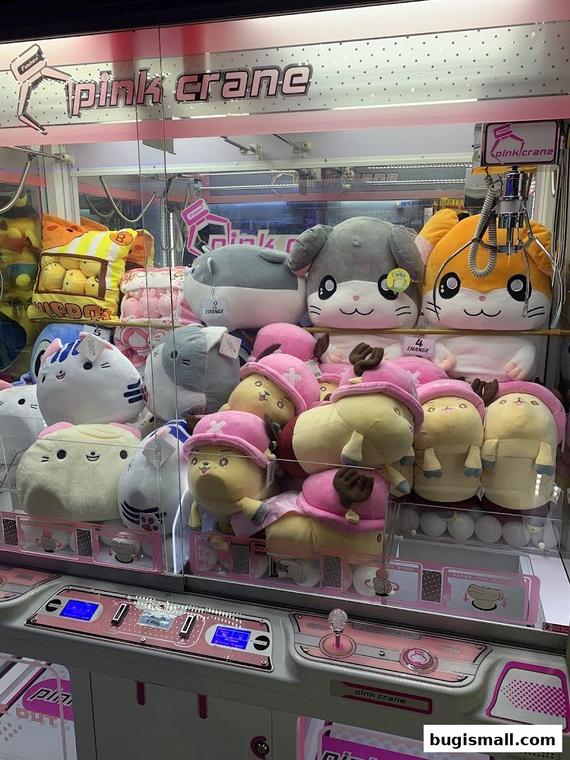 A claw machine filled with various cute plush toys, including animals and characters.