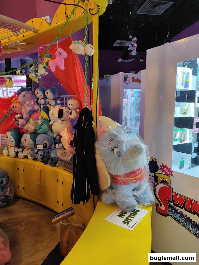 Prize Station shop with plush toys and claw machines.
