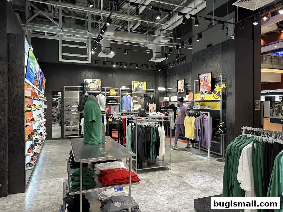 Interior view of a PUMA store showcasing apparel, footwear, and accessories.