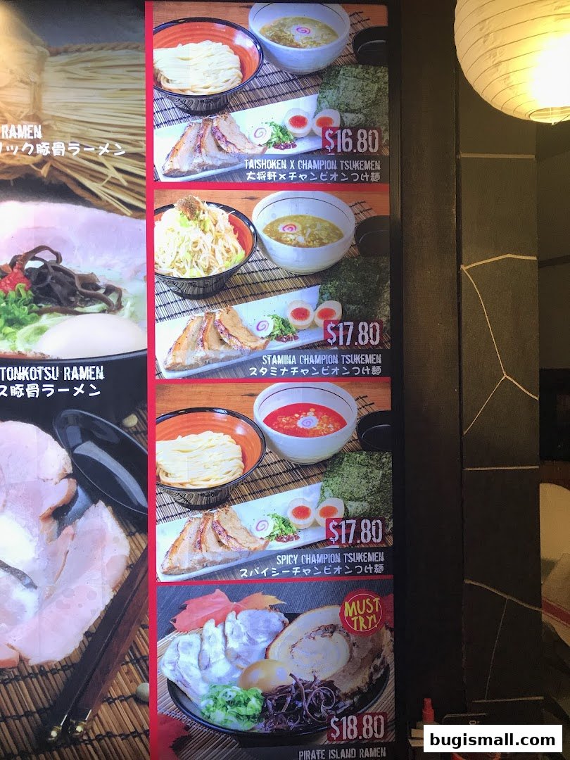A menu board displaying various ramen dishes with prices and images.