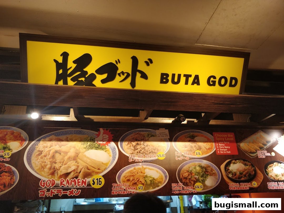 A display of various ramen dishes and other Japanese food items with prices.
