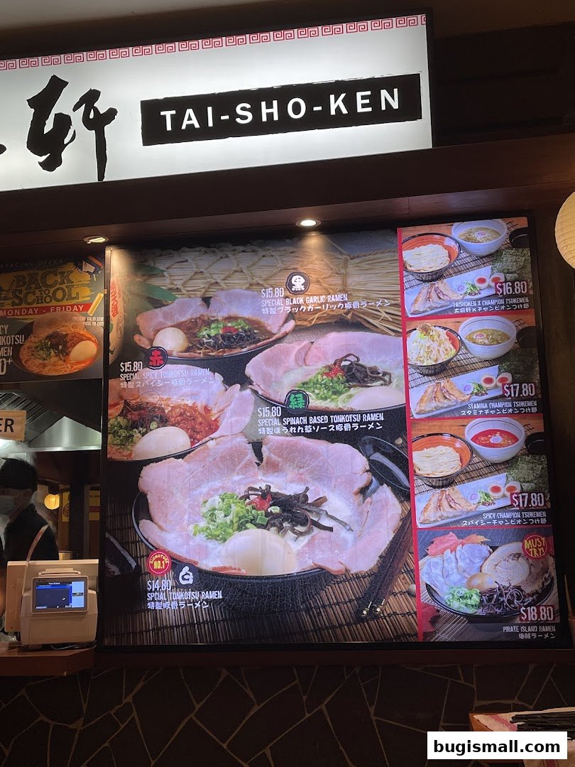 A menu board displaying various ramen dishes with prices and descriptions.