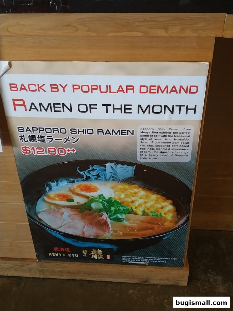 A sign advertising the Sapporo Shio Ramen, Ramen of the Month at Ramen Champion.