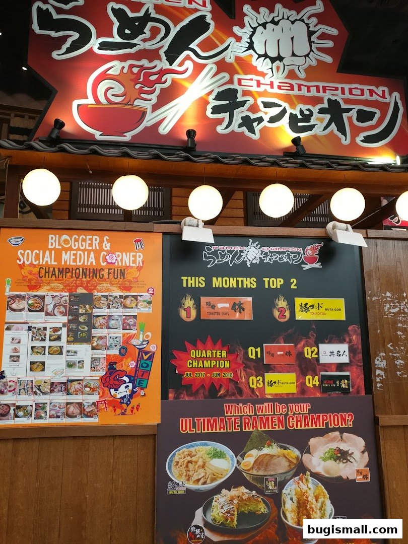 A vibrant display showcasing the Ramen Champion brand, menu highlights, and popular ramen dishes.