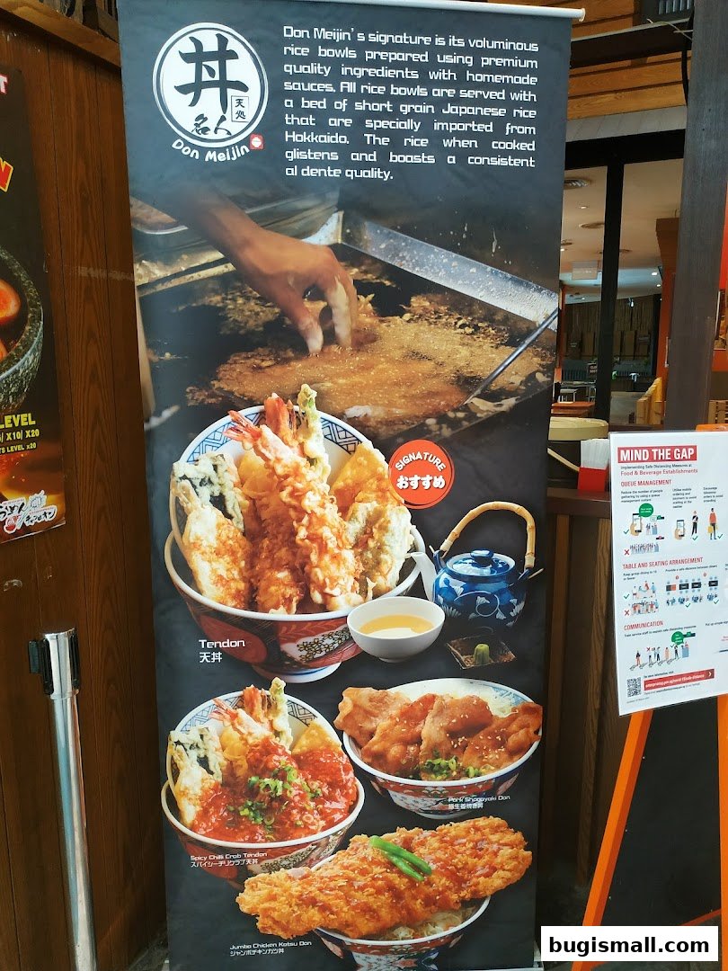 A promotional banner for Ramen Champion featuring various donburi bowls and ingredients.