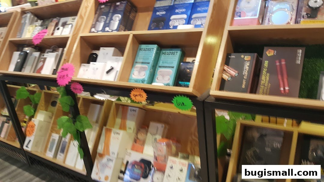 Shelves filled with various electronic accessories and gadgets, including headphones and phone accessories.