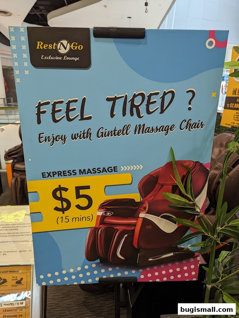 A sign advertising a 15-minute express massage for $5 using a Gintell massage chair.