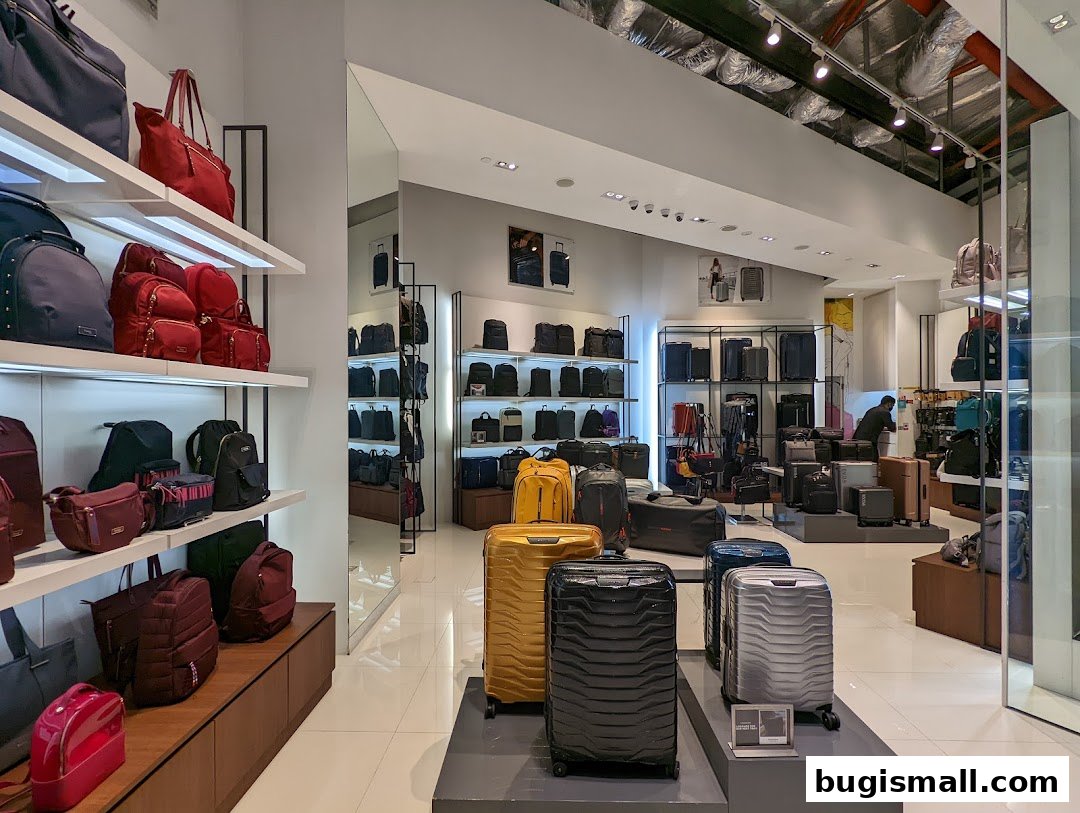 Interior view of a Samsonite store showcasing a wide variety of luggage and bags.