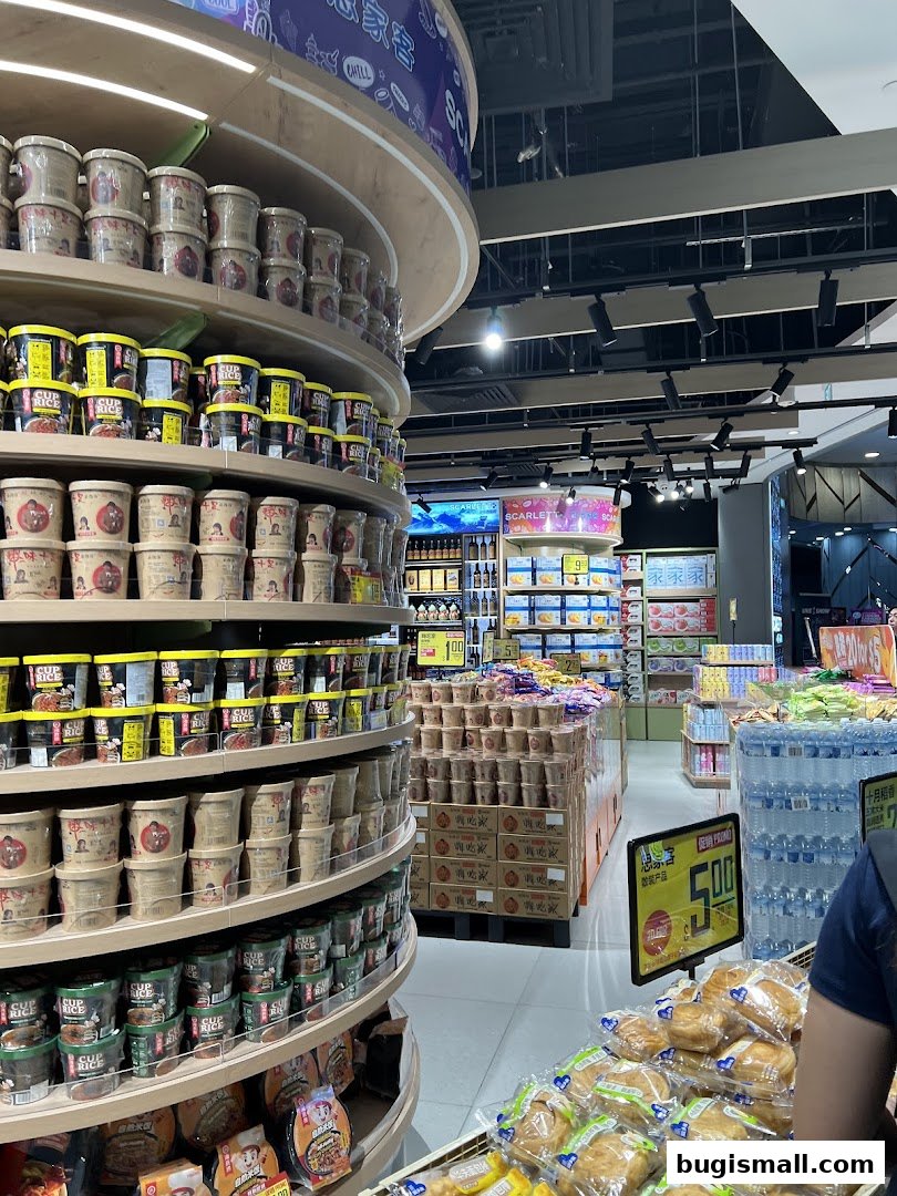 Interior view of Scarlett Supermarket showcasing shelves stocked with various food items and beverages.