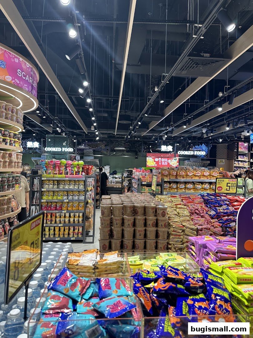 Interior view of Scarlett Supermarket showcasing aisles of snacks, instant noodles, and drinks.